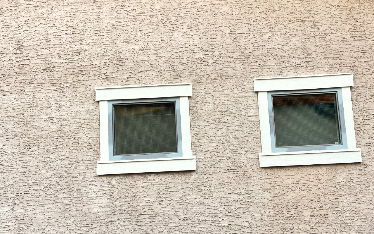 After: A window opening before and after full replacement