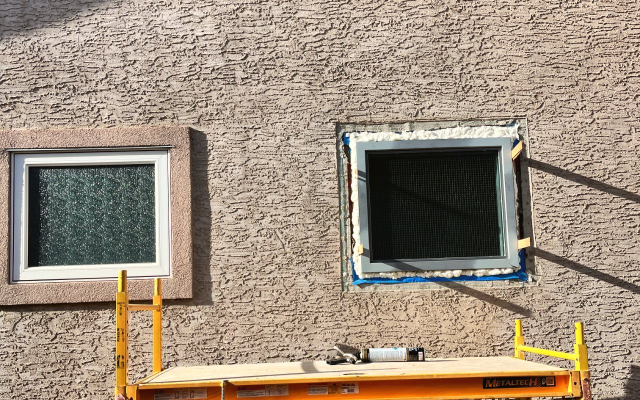 Before: A window opening before and after full replacement